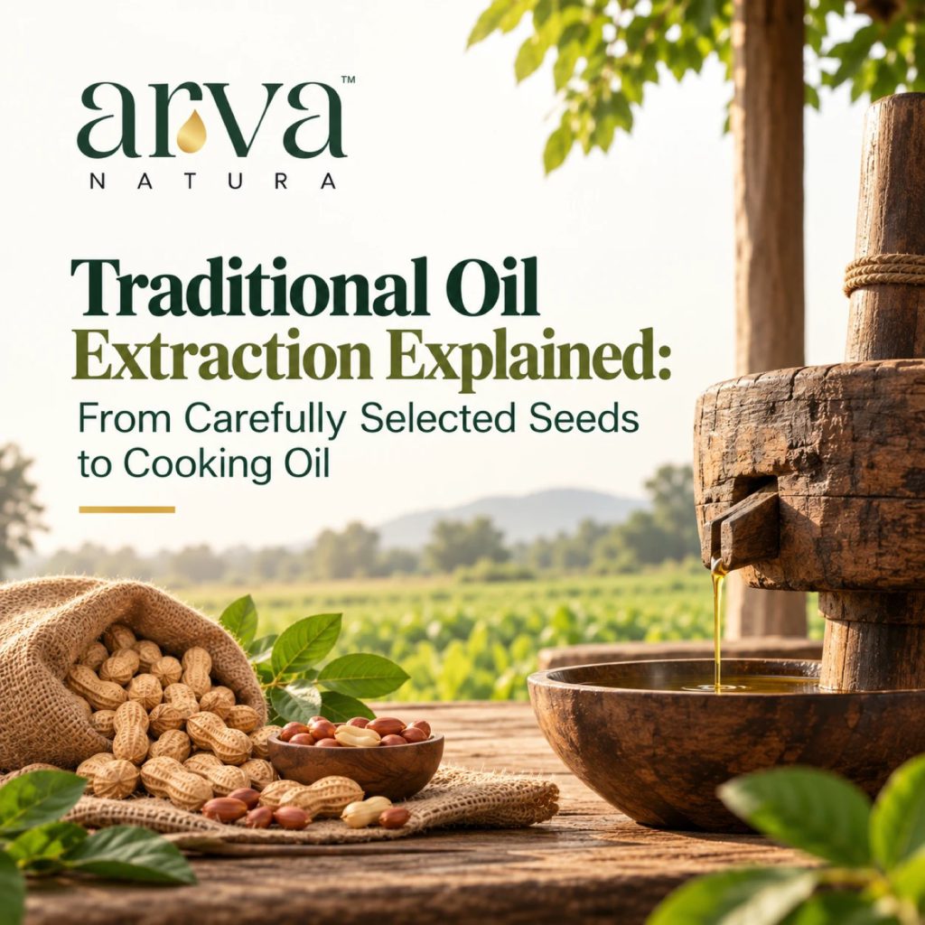 Oil running from a traditional wooden press into a bowl beside groundnuts